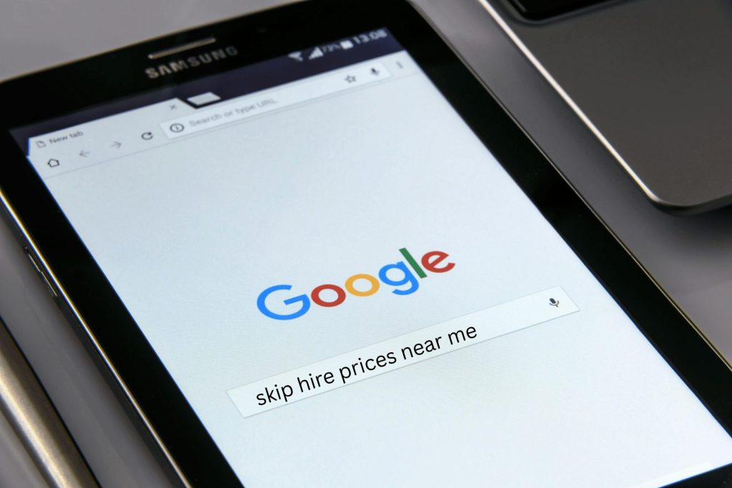 A Samsung phone where someone has called up a Google page and searched for skip hire prices near me